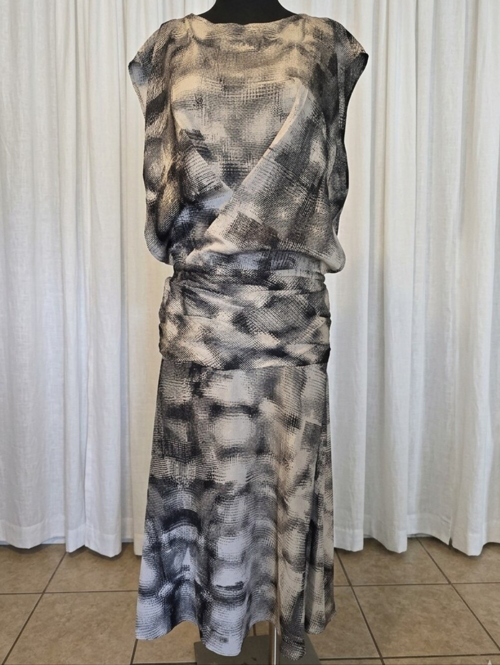 Tracy Reese dress with a draped blouson bodice and an abstract pattern.